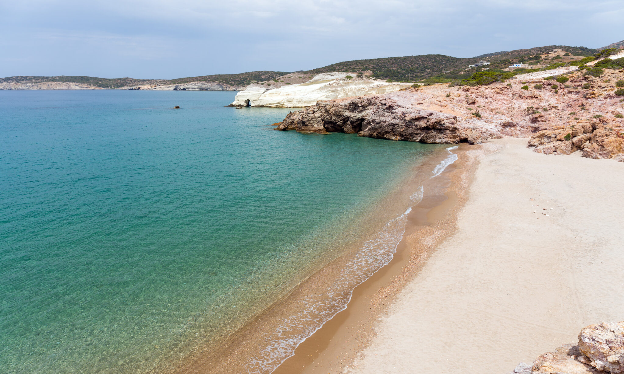 triades beach milos