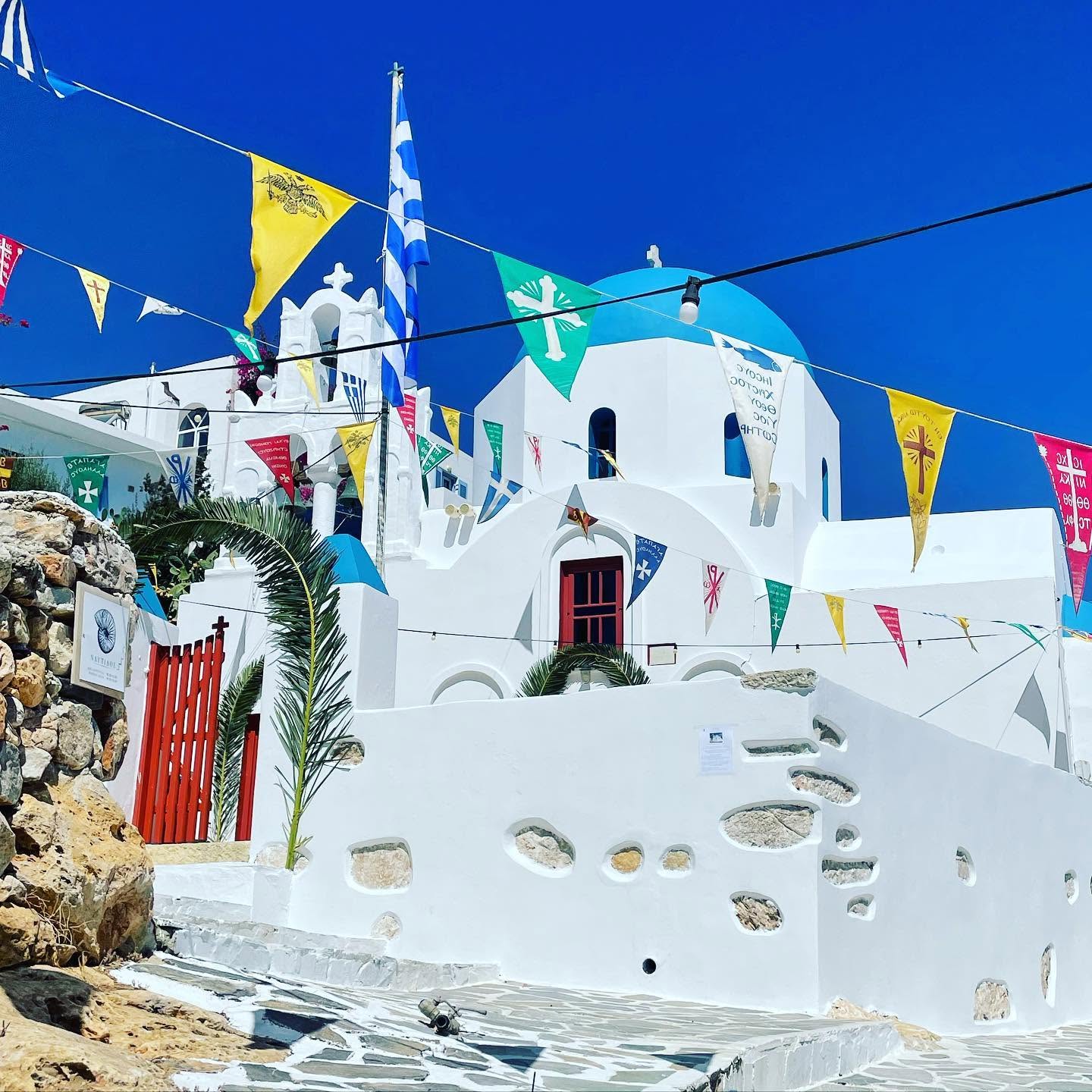 Whitewashed church decorated for a festival in Donousa
