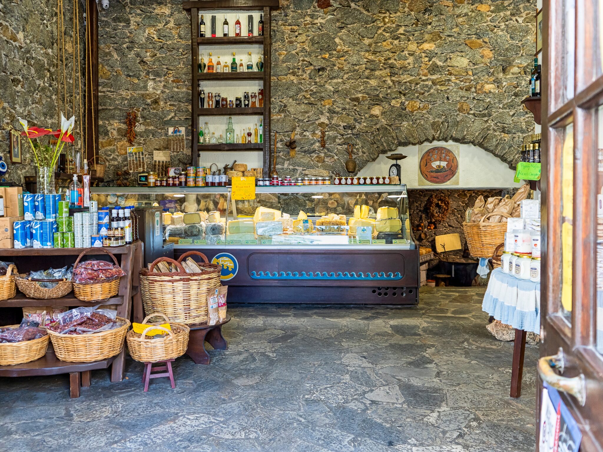 Cheeses of the South Aegean: Local products displayed inside a food shop on Paros