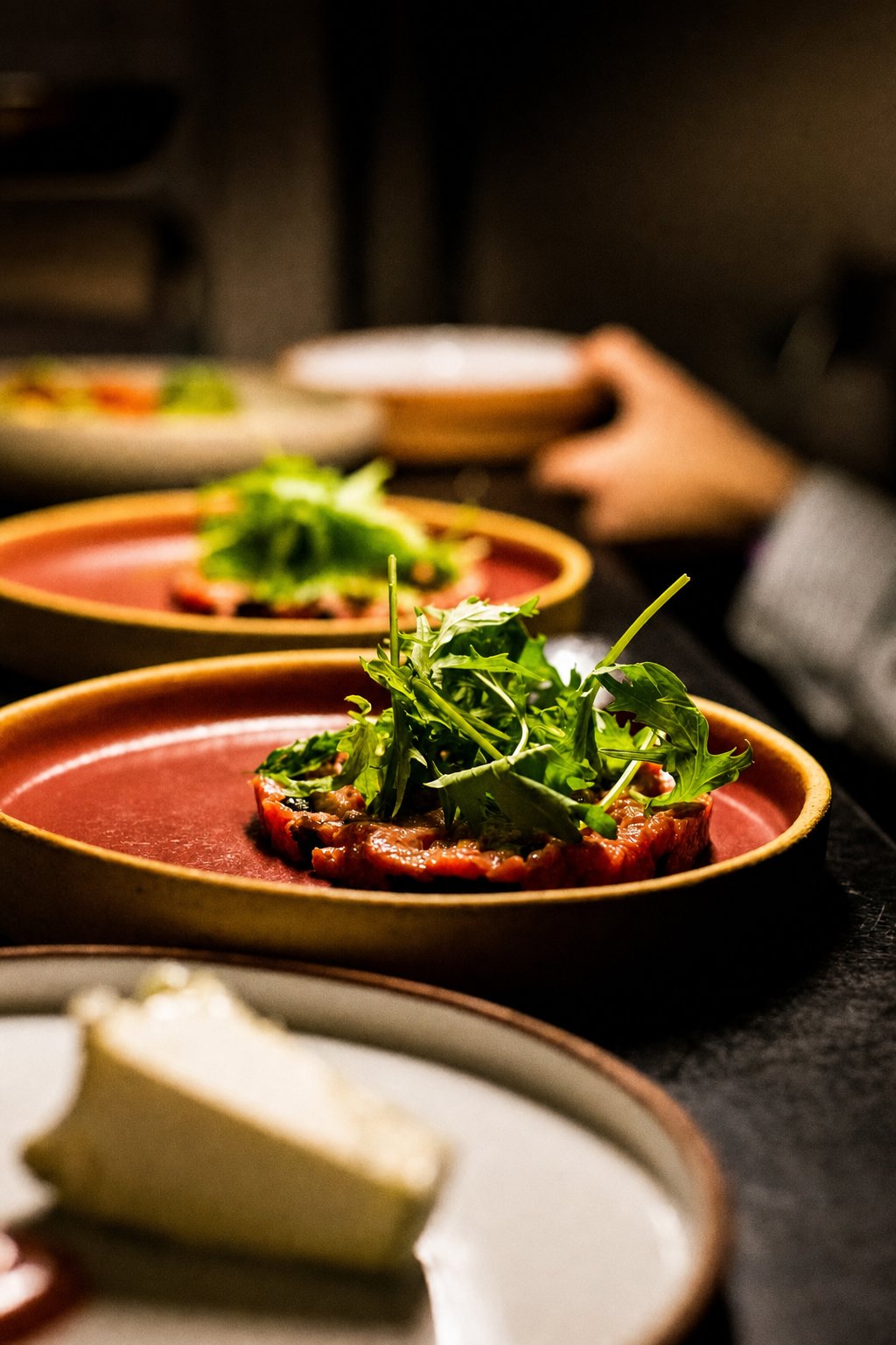 Koukaki&rsquo;s Best Places to Eat: Materia Prima, plates of food being arranged for service
