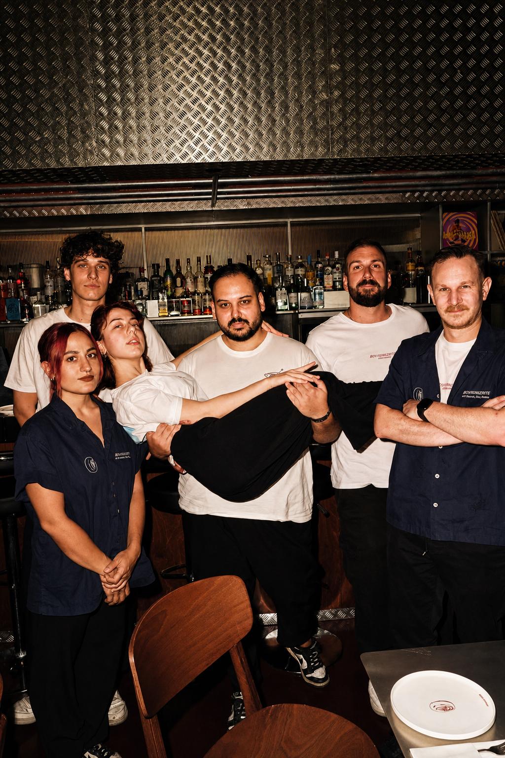 Koukaki&rsquo;s Best Places to Eat: Voulkanizater, the restaurant team gathered around a table